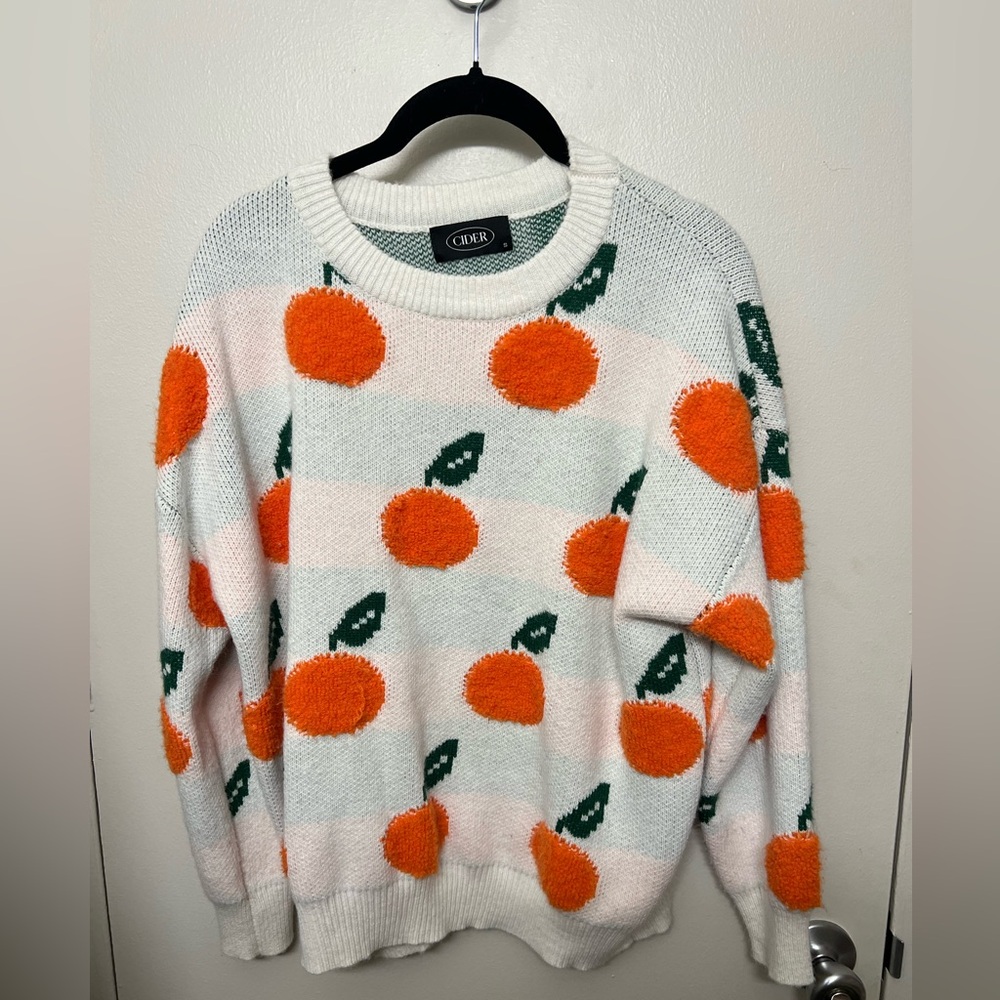 Orange pattern sweater in ivory